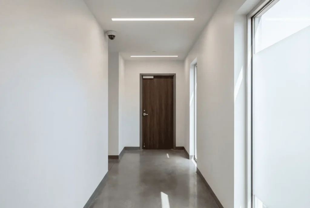 Interior door with a mechanical lock showing how physical security stops intruders when cameras only record incidents